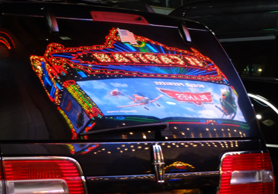 The El Captain Theatre marquee reflection in one of the VIP limousine windows